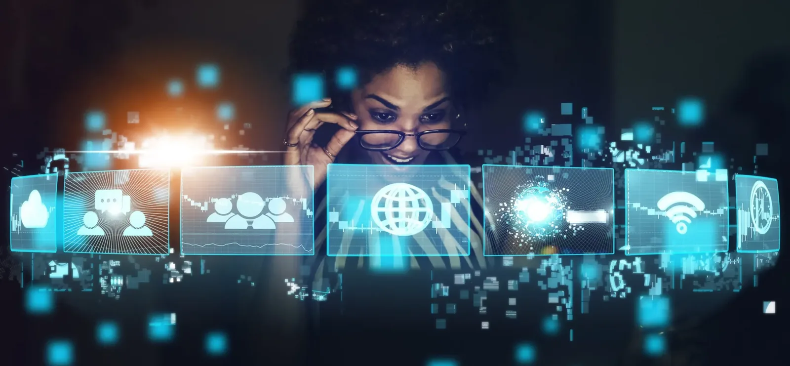 An excited woman interacting with futuristic holographic AI and big-data network interfaces in a dark office at night