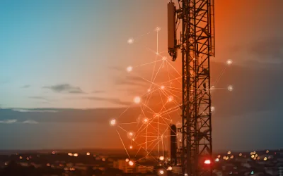 A telecommunications tower against a dusk sky, overlaid with a glowing network graph
